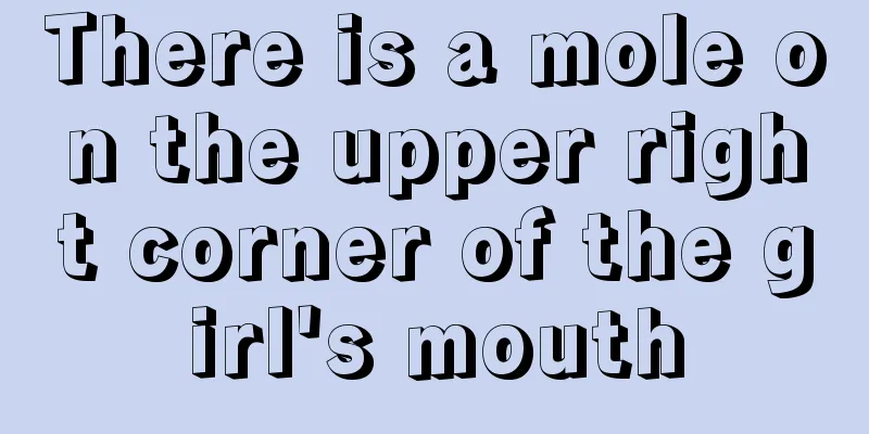 There is a mole on the upper right corner of the girl's mouth