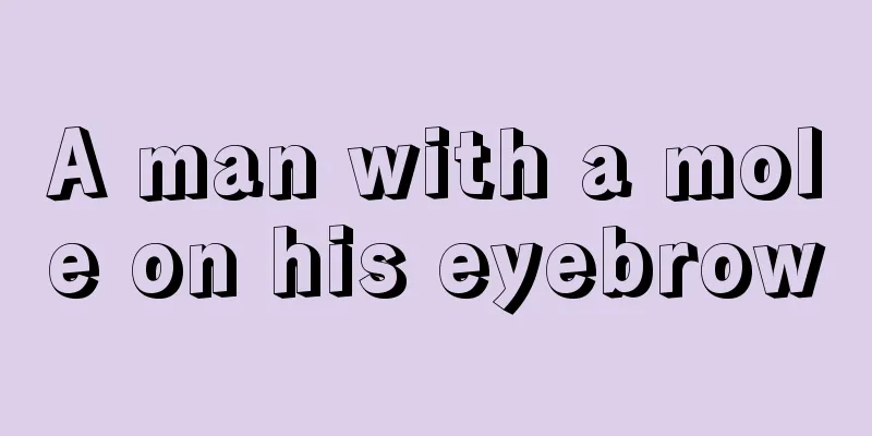 A man with a mole on his eyebrow