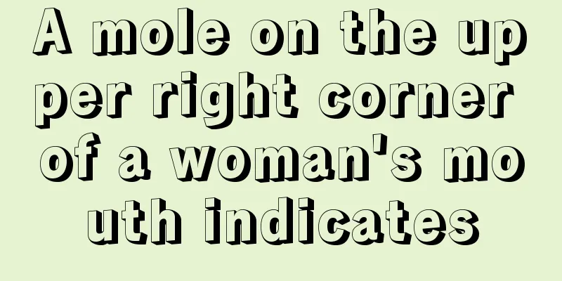 A mole on the upper right corner of a woman's mouth indicates