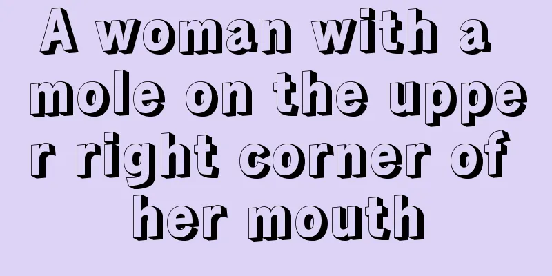 A woman with a mole on the upper right corner of her mouth