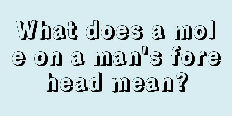 What does a mole on a man's forehead mean?