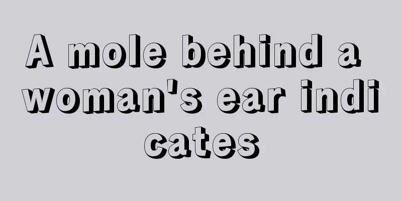 A mole behind a woman's ear indicates
