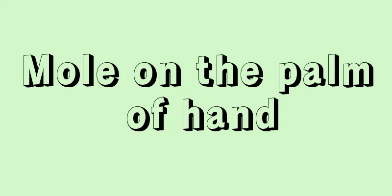 Mole on the palm of hand