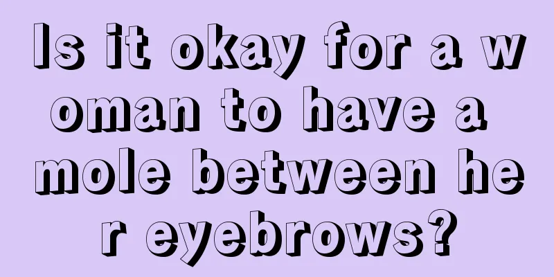 Is it okay for a woman to have a mole between her eyebrows?