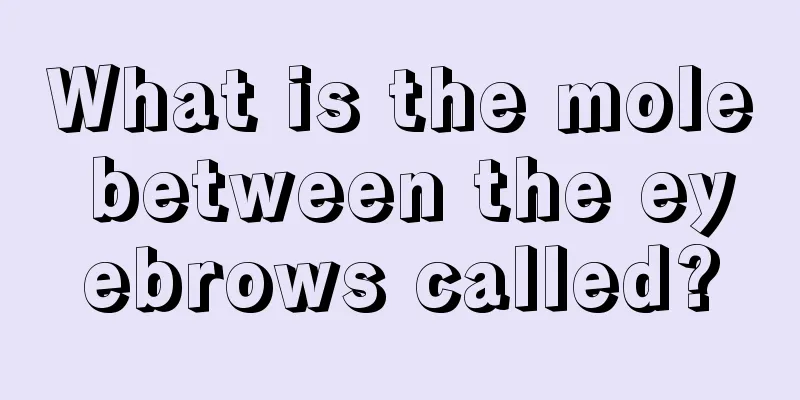 What is the mole between the eyebrows called?
