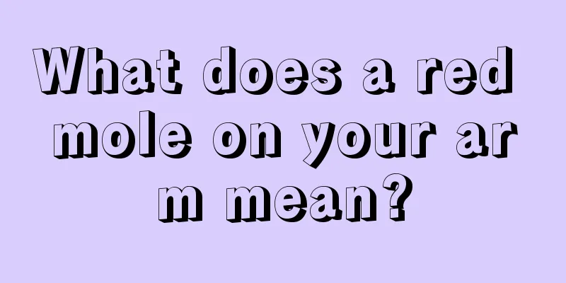 What does a red mole on your arm mean?