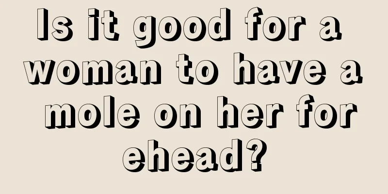Is it good for a woman to have a mole on her forehead?