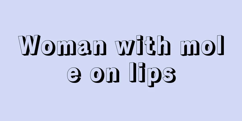 Woman with mole on lips