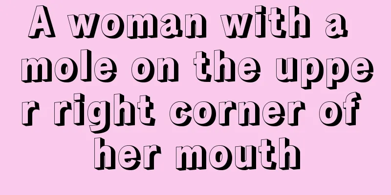 A woman with a mole on the upper right corner of her mouth