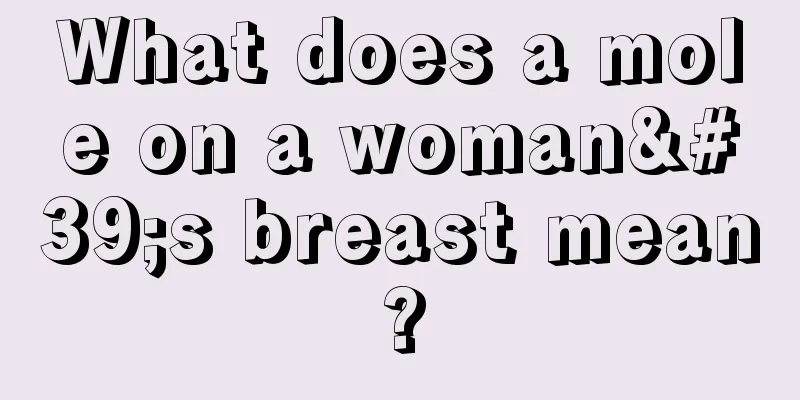 What does a mole on a woman's breast mean?