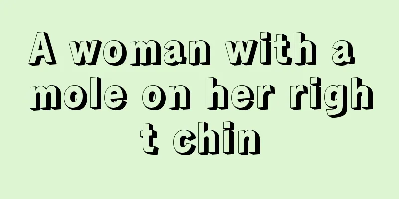 A woman with a mole on her right chin