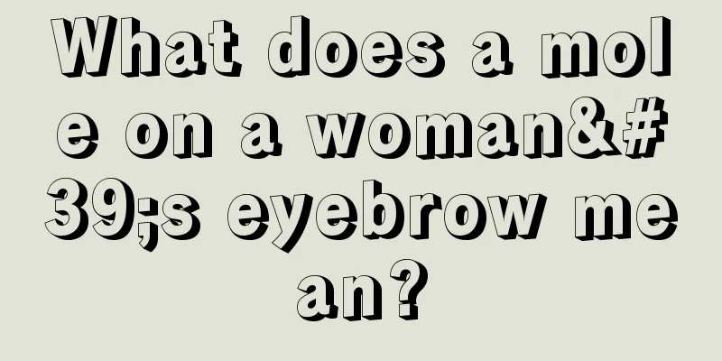 What does a mole on a woman's eyebrow mean?