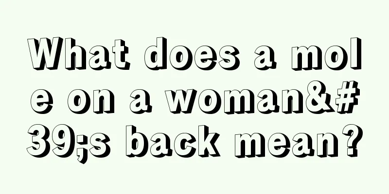 What does a mole on a woman's back mean?