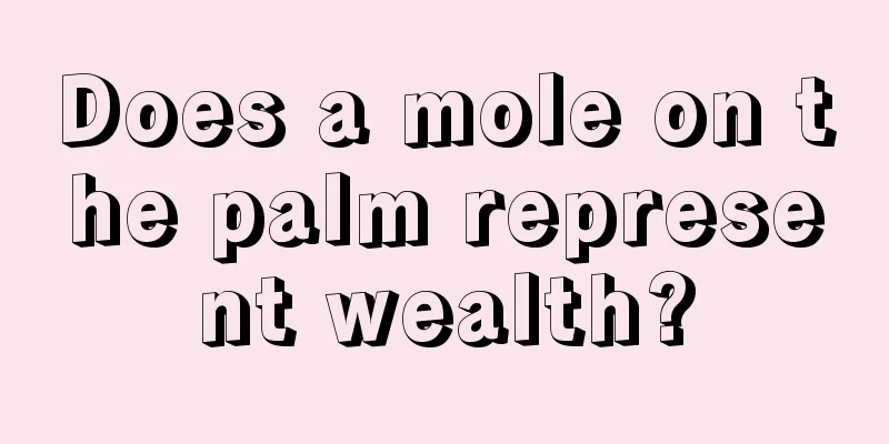 Does a mole on the palm represent wealth?