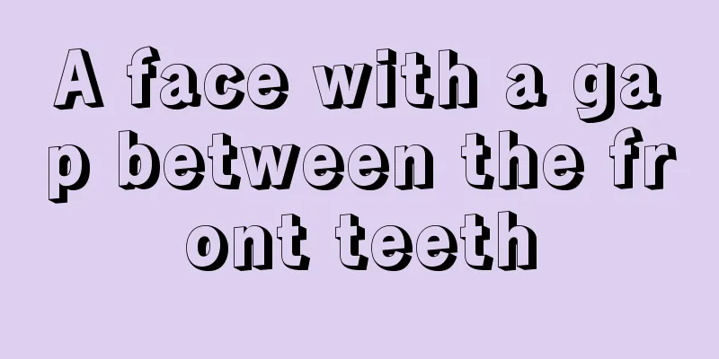 A face with a gap between the front teeth