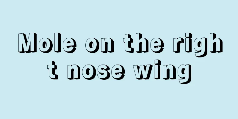 Mole on the right nose wing