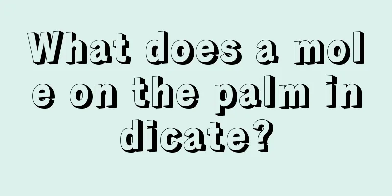 What does a mole on the palm indicate?