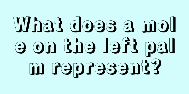 What does a mole on the left palm represent?