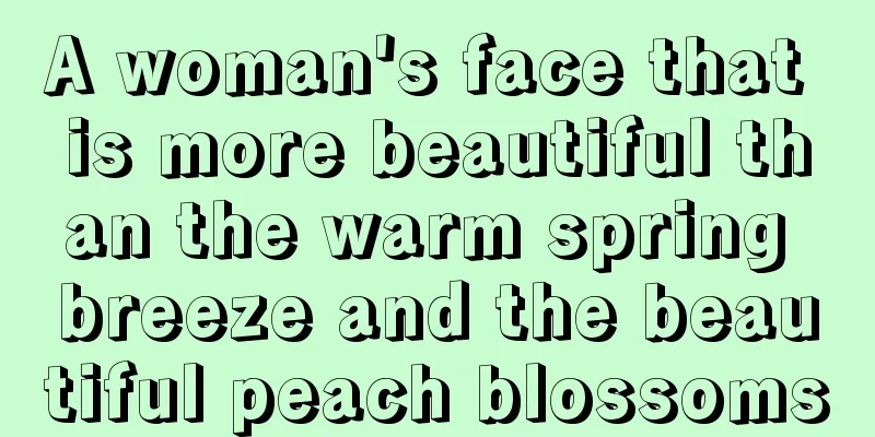 A woman's face that is more beautiful than the warm spring breeze and the beautiful peach blossoms